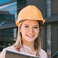 professional-architect-woman-standing-outdoors-Y43UL4W